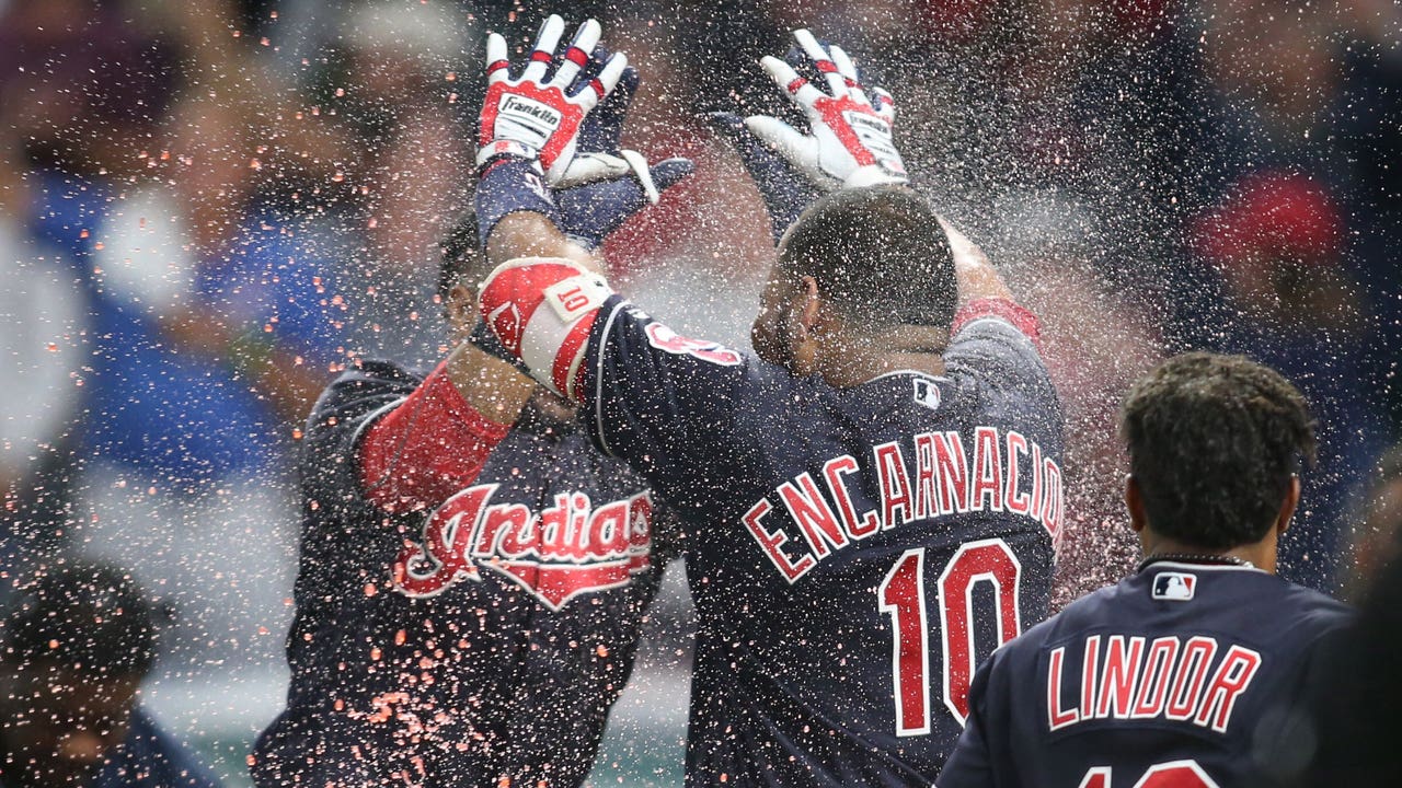 Encarnacion's slam sends Indians past Angels 11-7 in extra innings